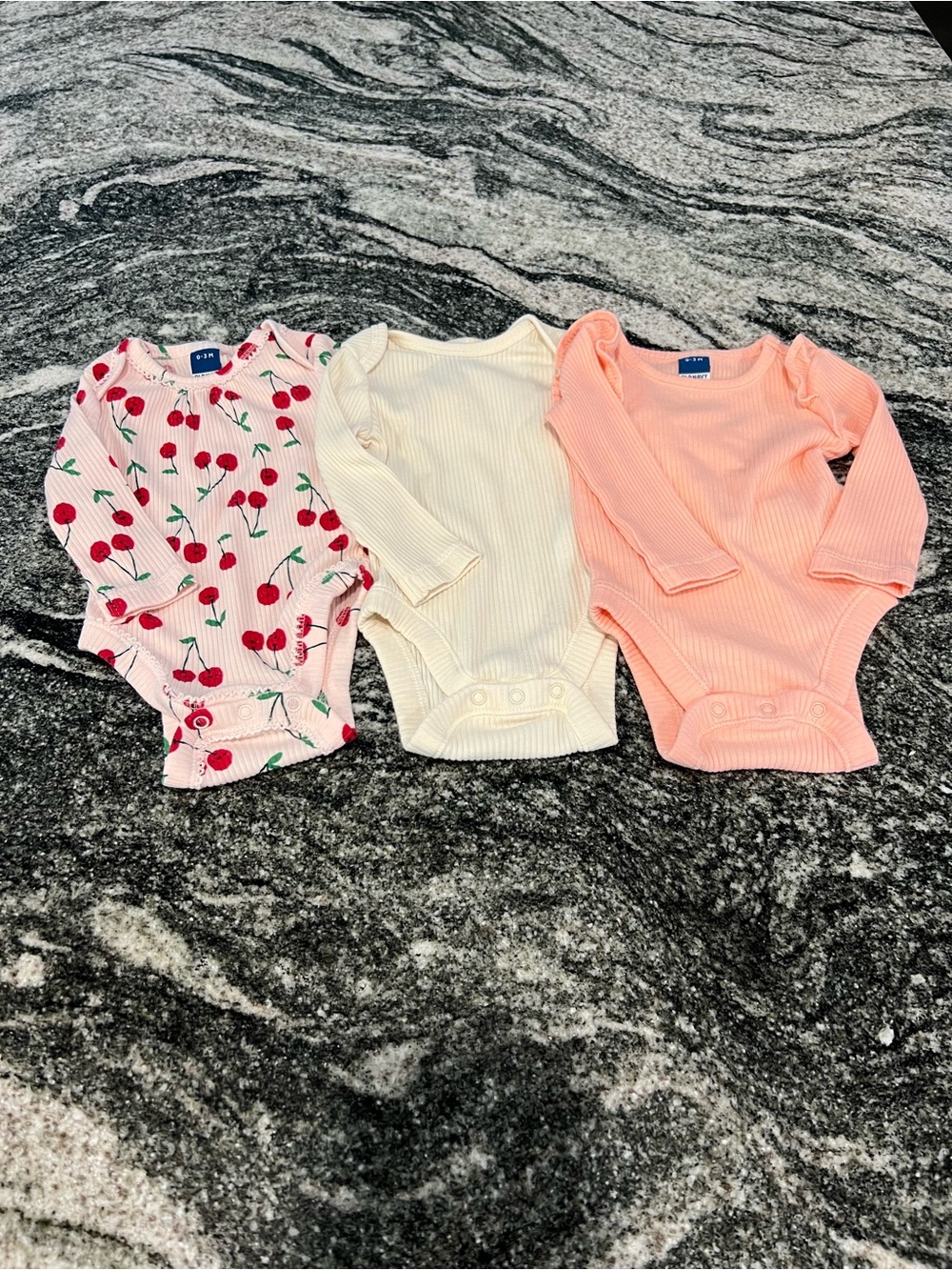 Old Navy Ribbed Long-Sleeve Baby One-Piece Trio - Cherry Print, Cream & Peach